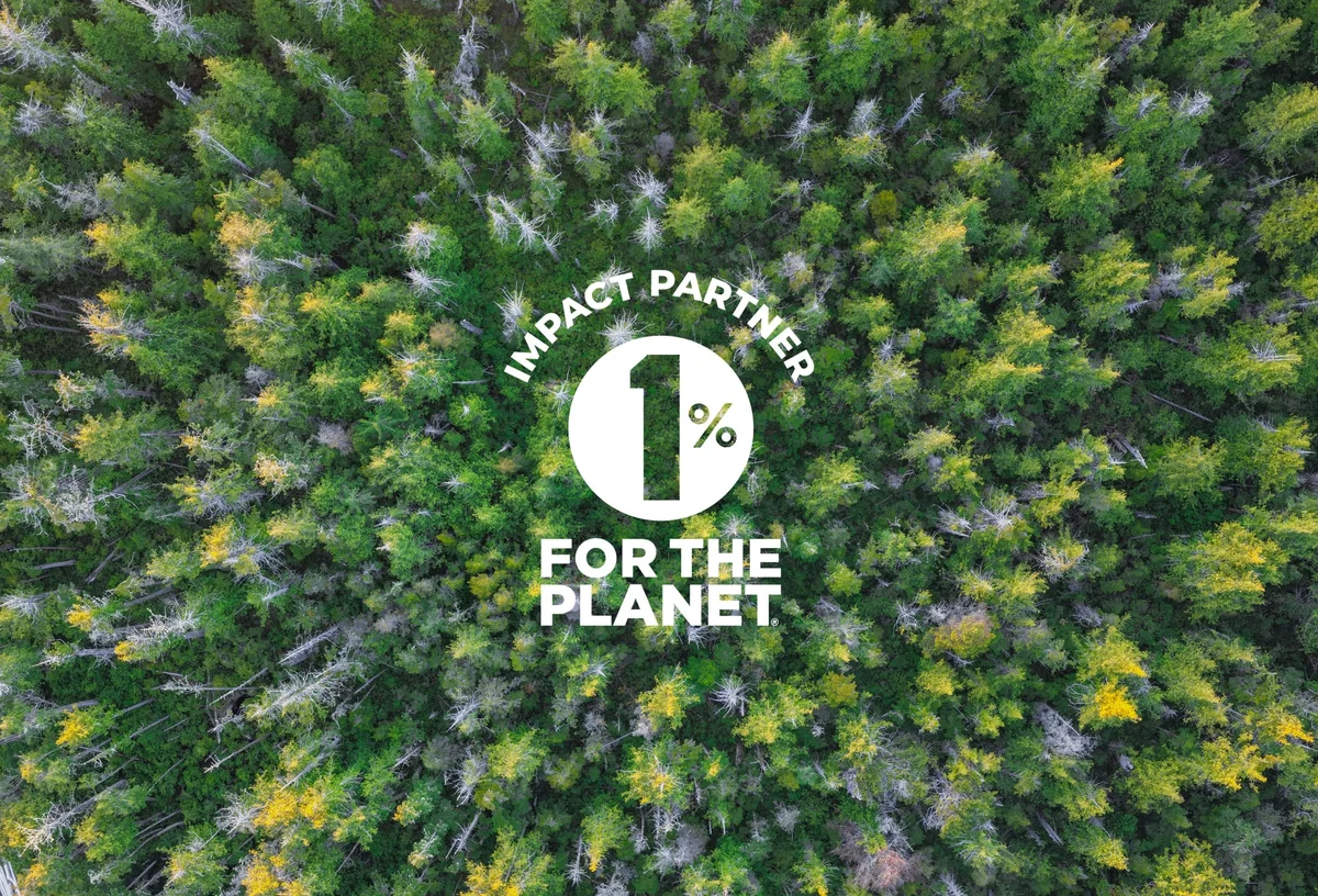 Aerial forest view with white text overlay reading 